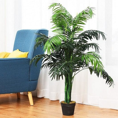 Potted plant in a room with a blue chair and yellow cushions.