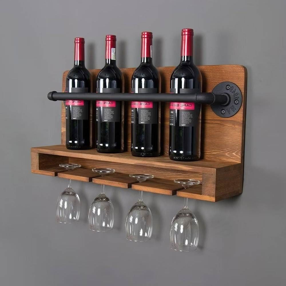 Wooden wall-mounted wine rack with four bottles and four glasses on a gray background