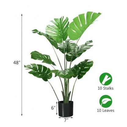 Artificial monstera plant with measurements and details on a white background