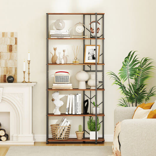 Decorative bookshelf in a living room with books, plants, and decor items.