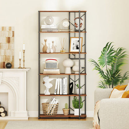 Decorative bookshelf in a living room with books, plants, and decor items.