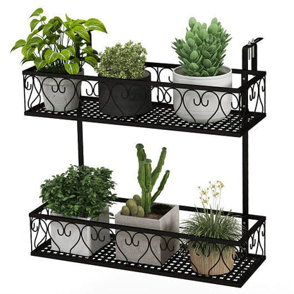 Black metal plant stand with multiple potted plants on a white background