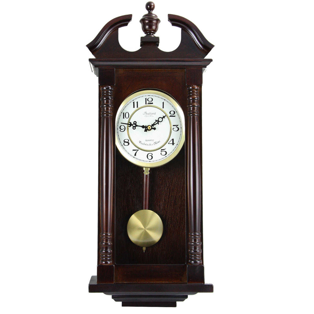 Wooden wall clock with pendulum on a white background