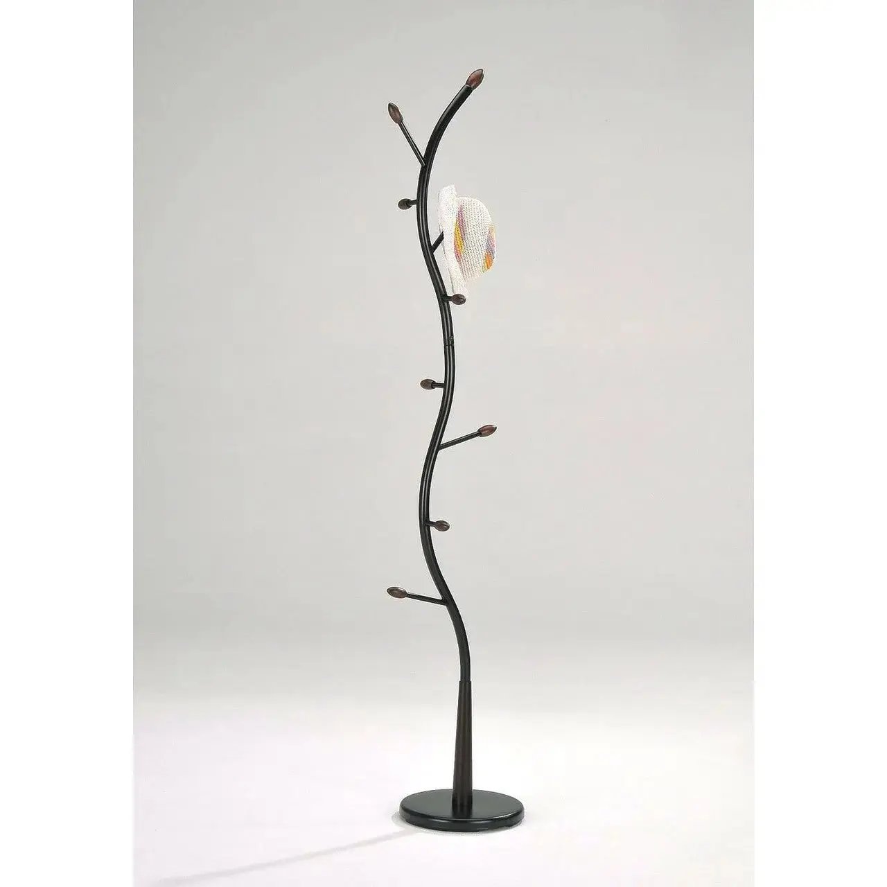 Decorative floor lamp with branch-like design on a white background