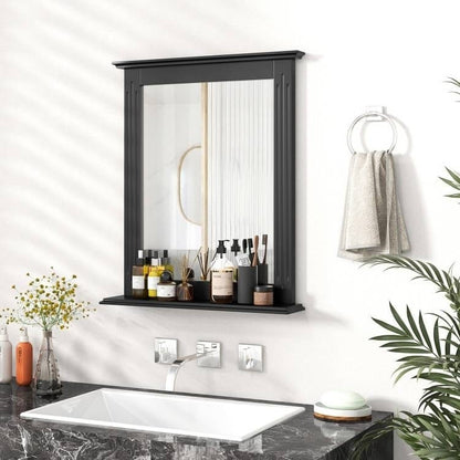 Bathroom setup with a mirror, sink, and various items on a shelf.