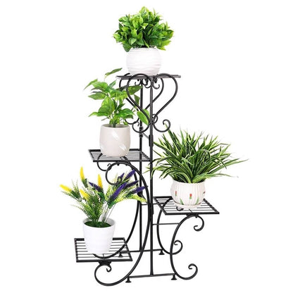 Black metal plant stand with multiple shelves holding potted plants on a white background