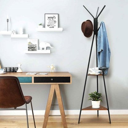 Home office with wooden desk, chair, coat rack, and shelves.