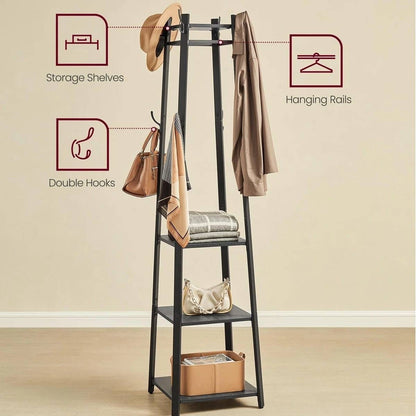 Leaning ladder-style coat rack with storage shelves, hanging rails, and double hooks against a beige wall.