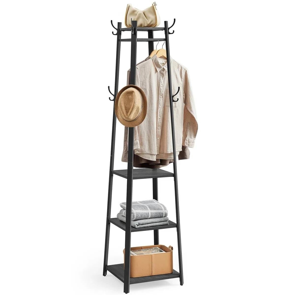 Black ladder-style coat rack with clothes and a hat on a white background