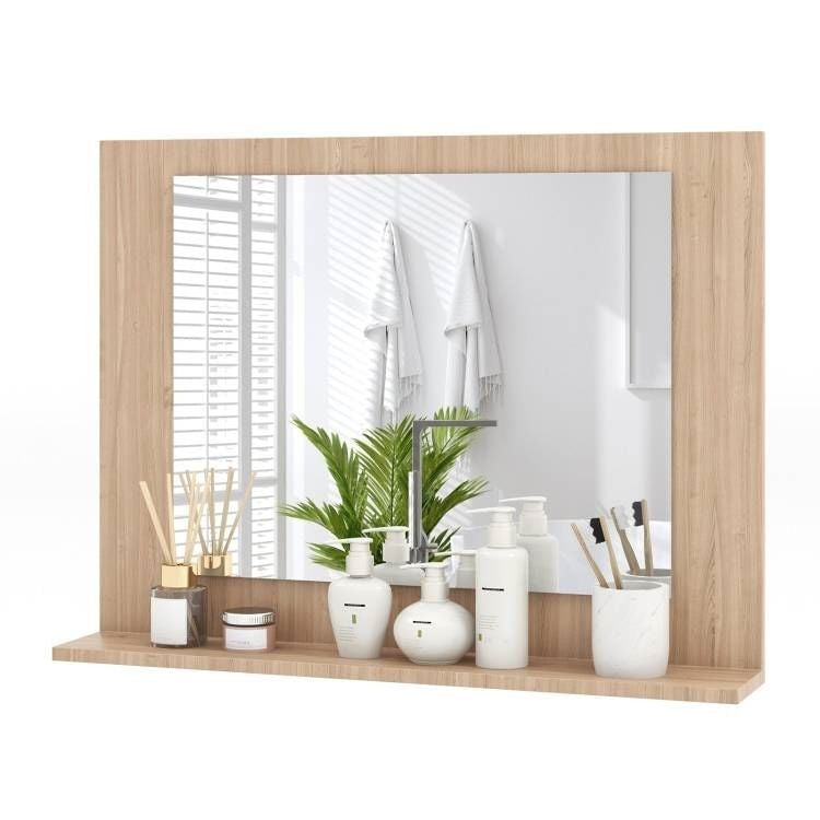Wooden vanity mirror with decorative items on a white background