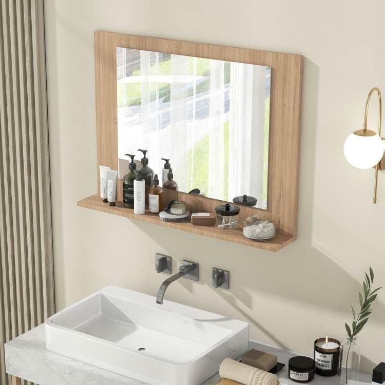 Bathroom setup with a sink, mirror, and various toiletries on a shelf.